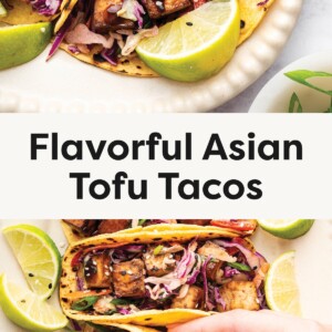 Close-up of two grilled corn tortillas filled with crispy tofu cubes, colorful slaw, scallions, sesame seeds, and lime wedges on a plate. Hand picking up a taco filled with tofu, slaw, and scallions from a plate with lime wedges and more tacos.