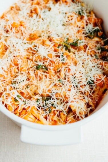 Cauliflower baked ziti topped with parmesan before its cooked.