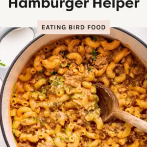Pot of creamy Healthy Hamburger Helper with a wooden spoon.