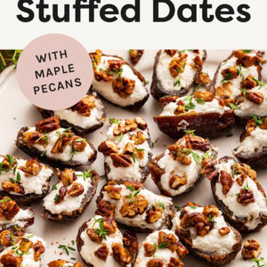 Dates stuffed with goat cheese and pecans on a platter.