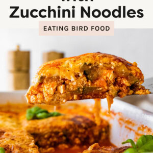 Slice of Tofu Lasagna with Zucchini Noodles being lifted from a pan with a spatula.