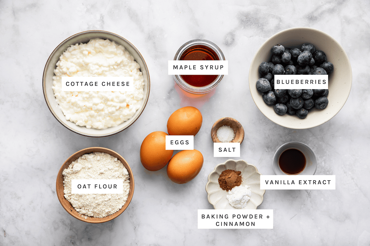 Cottage cheese, maple syrup, blueberries, oat flour, eggs, salt, vanilla extract, baking powder, cinnamon