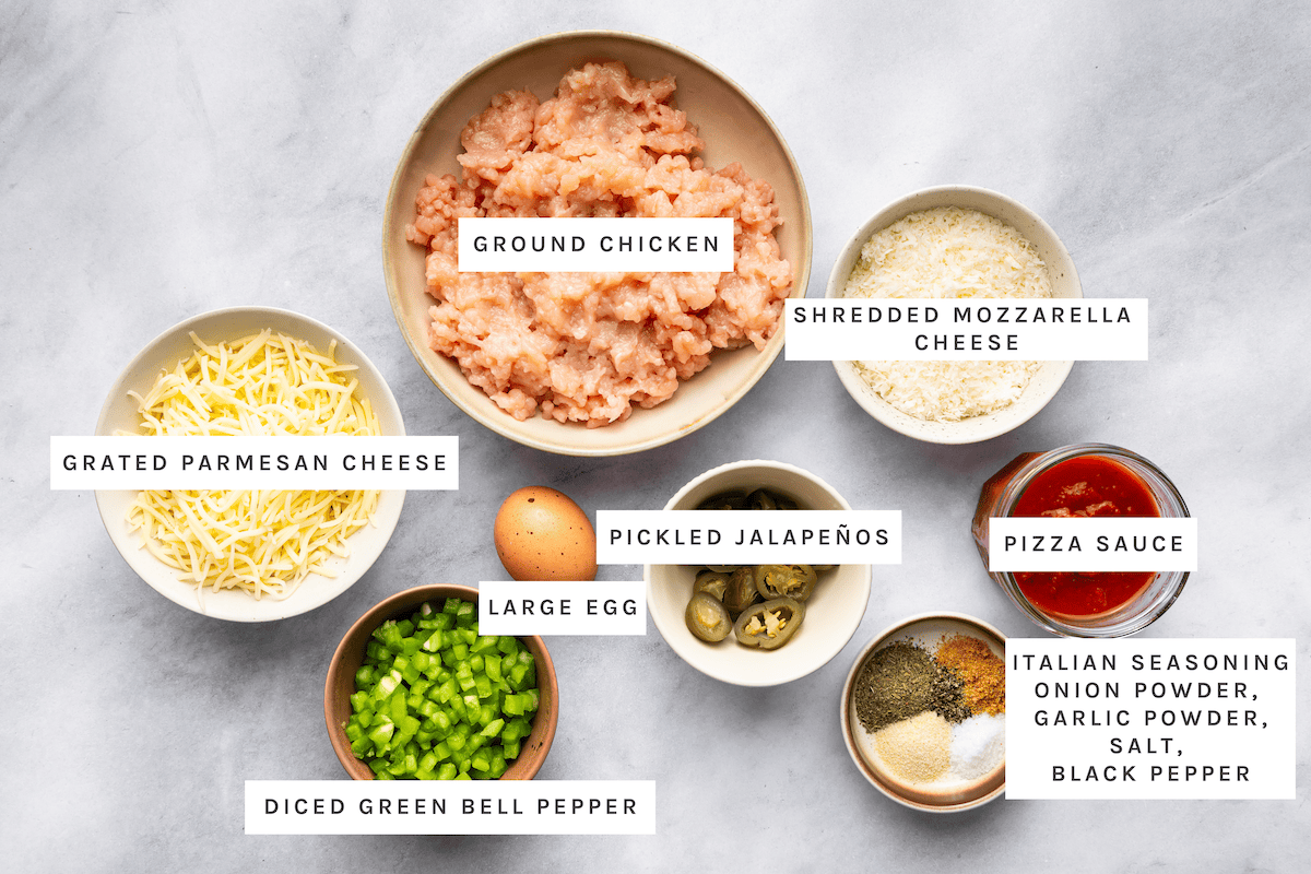 Ground chicken, shredded mozzarella cheese, grated Parmesan cheese, large egg, diced green bell pepper, pickled jalapeños, pizza sauce, Italian seasoning, onion powder, garlic powder, salt, black pepper