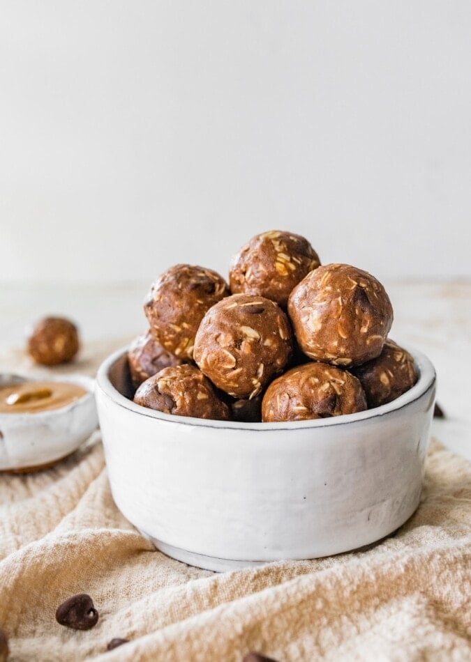 A bowl of chocolate peanut butter protein balls.