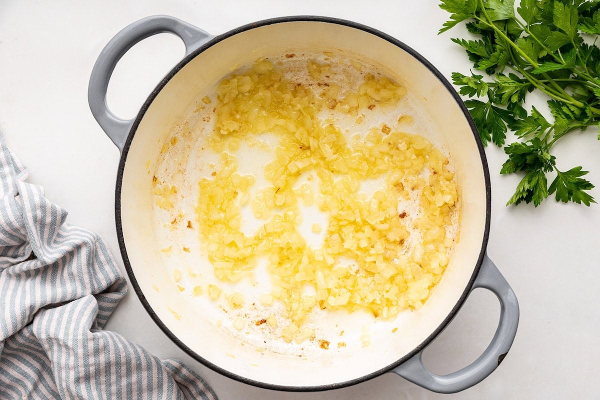 Sauteed onion and garlic in a large pot.