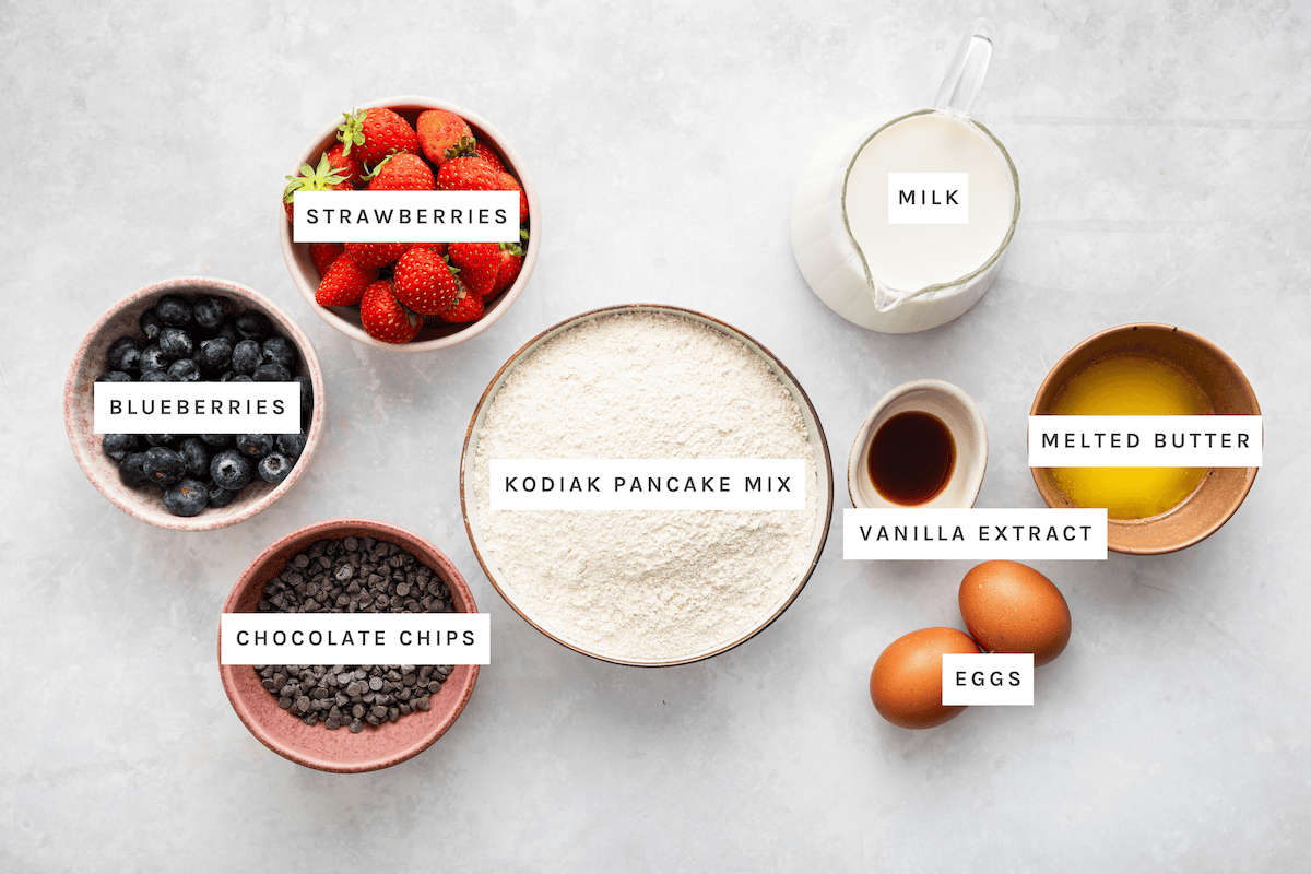 Strawberries, blueberries, chocolate chips, Kodiak pancake mix, milk, melted butter, vanilla extract, eggs